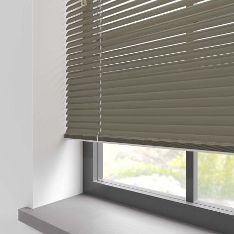 A darker grey aluminium blind in the kitchen 